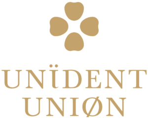 Opalone logo składa się z czterech zaokrąglonych płatków ułożonych w okrąg nad słowami UNIDENT UNION - podkreślającymi metamorfozę uśmiechu - napisanymi wielką czcionką szeryfową, z dwiema kropkami nad I w UNIDENT i ukośnikiem przez O w UNION.